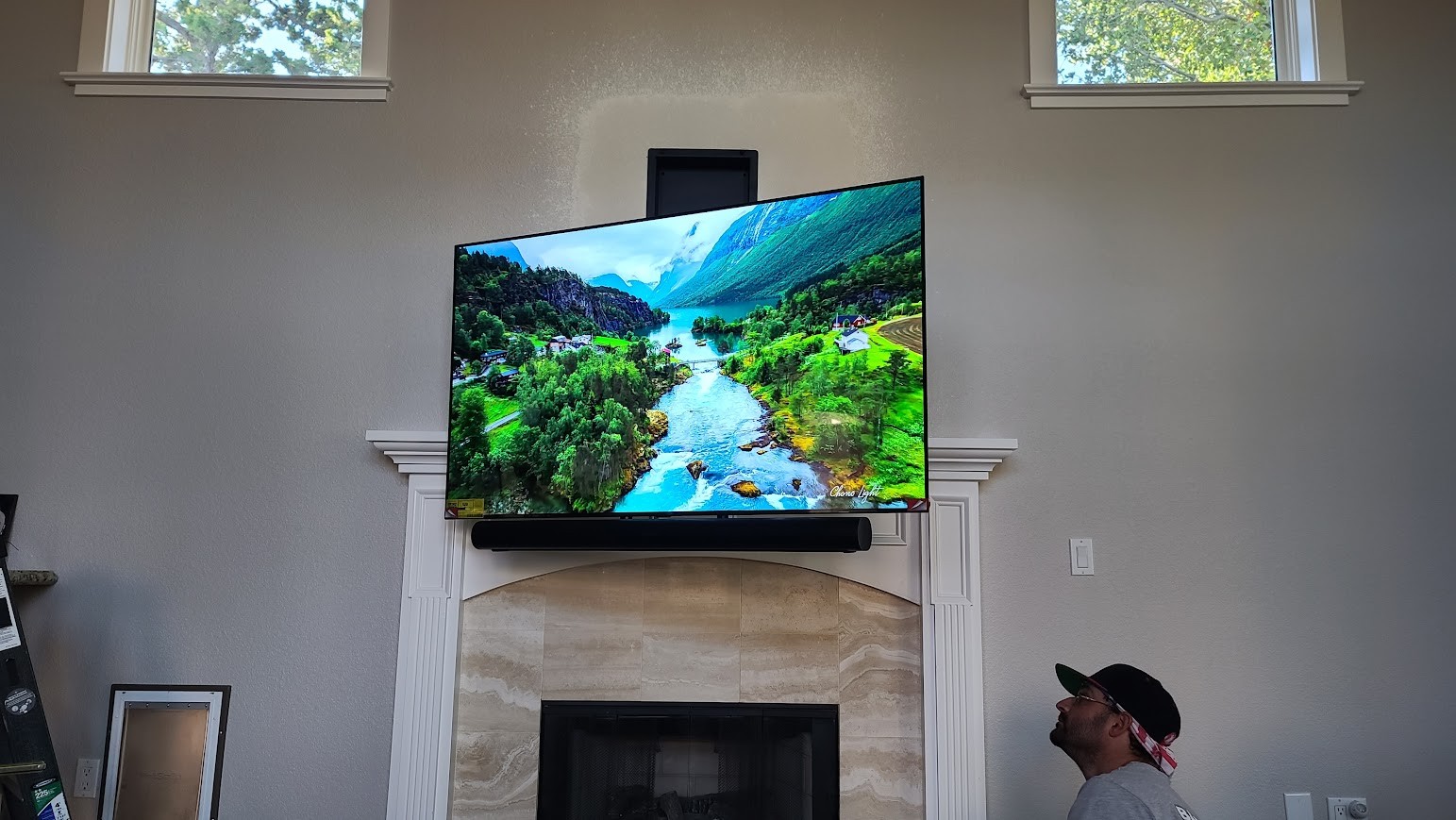TV mounted above a fireplace