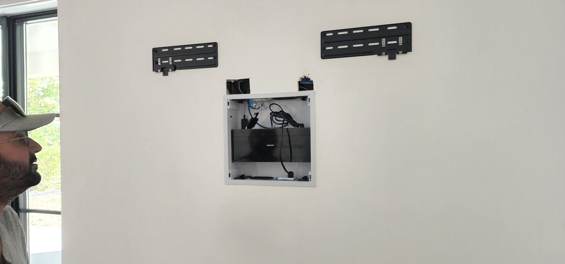 TV mounting and recessed wiring preparation