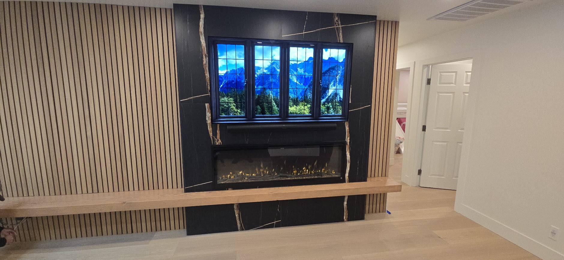TV and linear fireplace